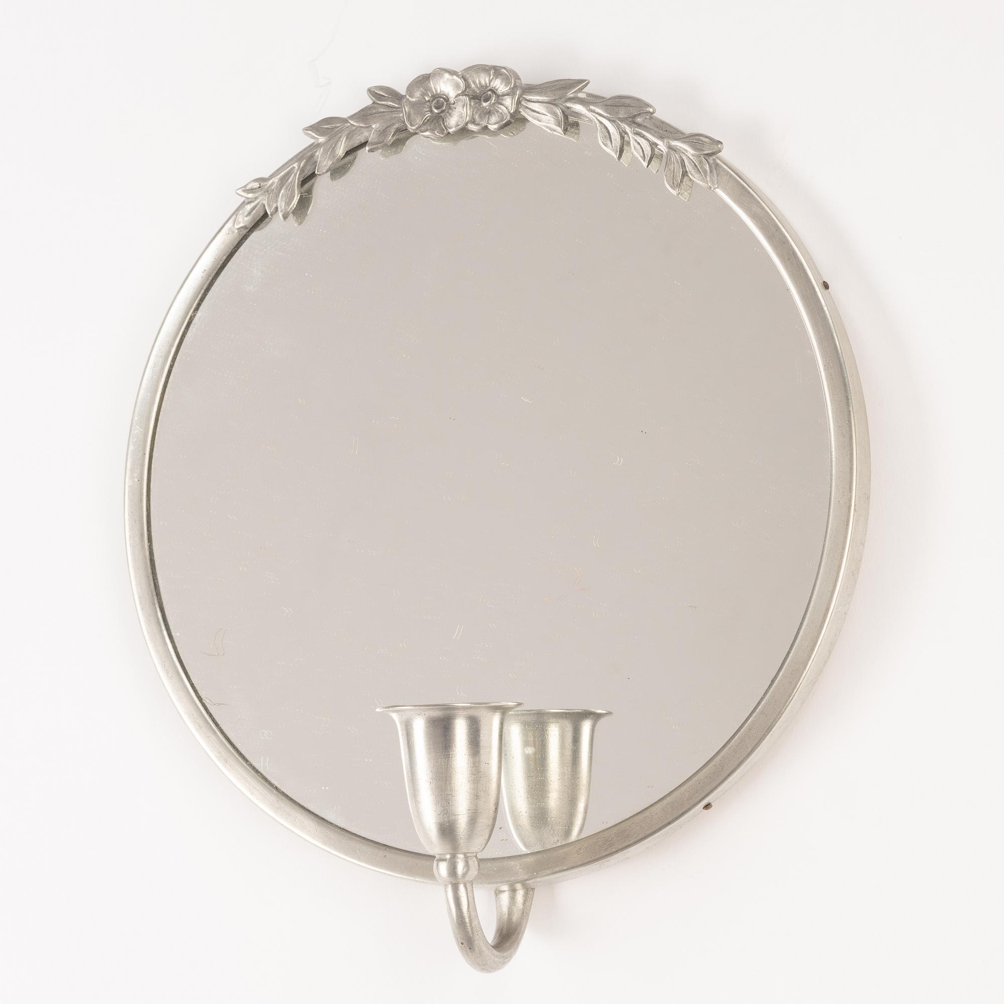 Mirror and a pair of wall sconces, 1920s/30s.