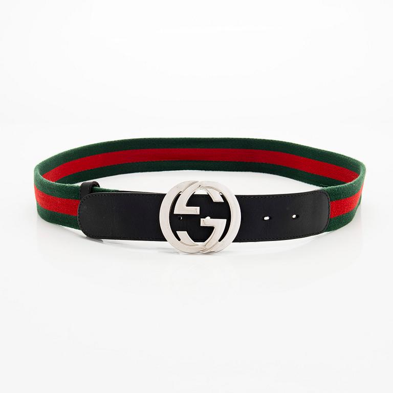 Gucci, A 'Verbier' scarf and a belt.