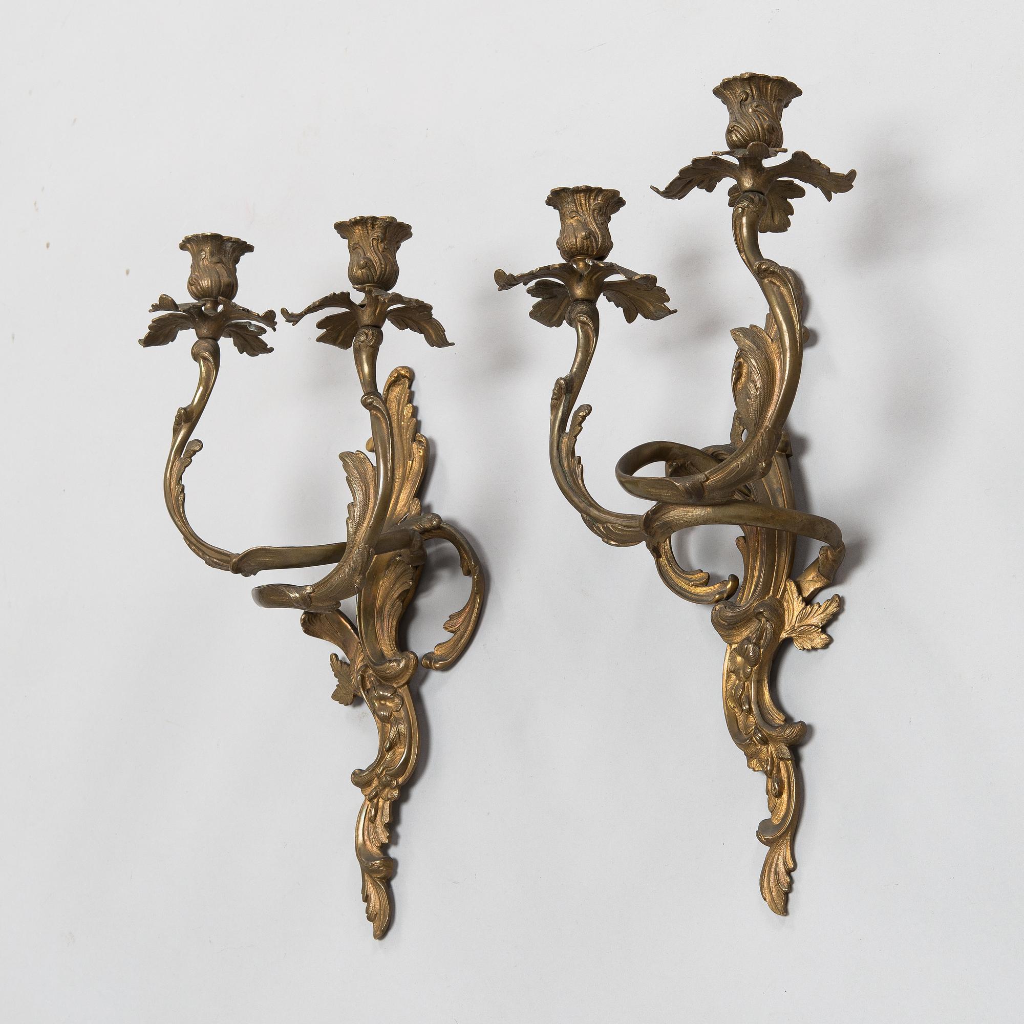 A pair of wall sconces, circa 1900.