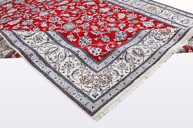 A carpet, Nain, part silk, 9 LAA, ca 384 x 296 cm.