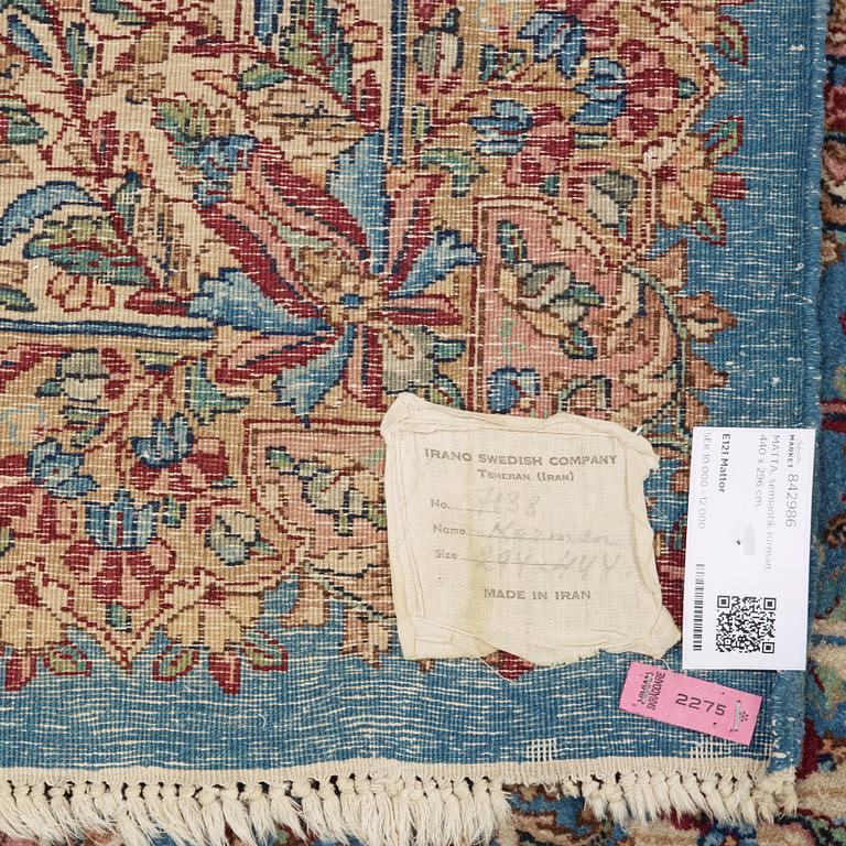 A semi-antique Kerman carpet,  440 x 296 cm.
