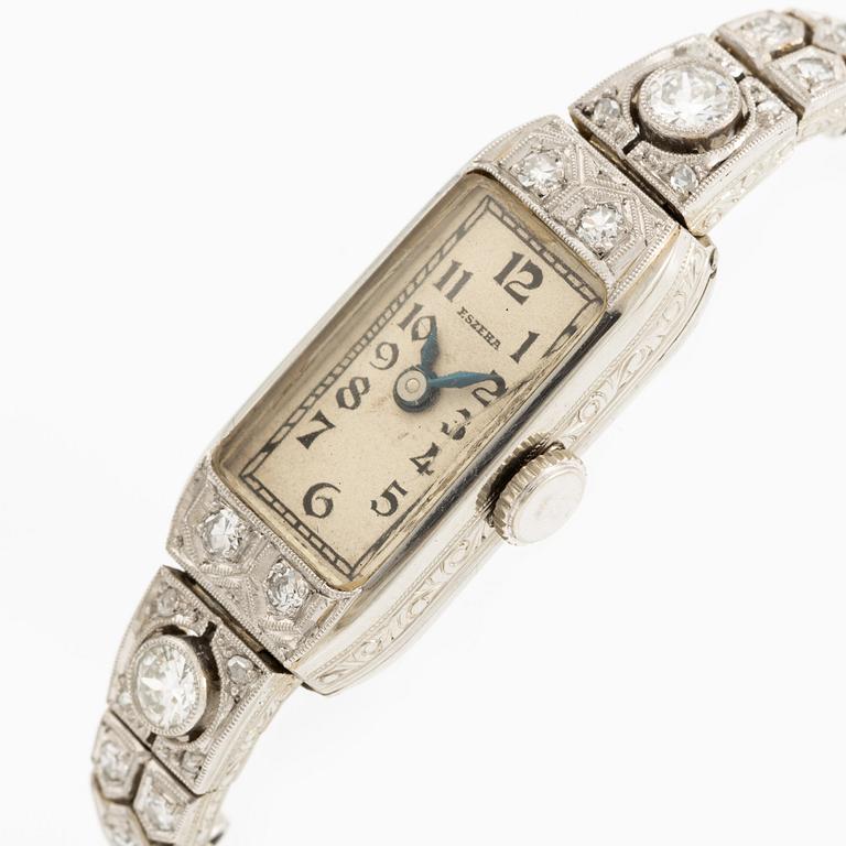 Smyckesur/Aftonklocka, boett 18K vitguld med diamanter.