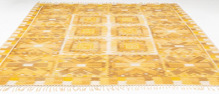 Barbro Nilsson, a carpet, "Nejlikan gul", flat weave, ca 334,5 x 279 cm, signed AB MMF BN.