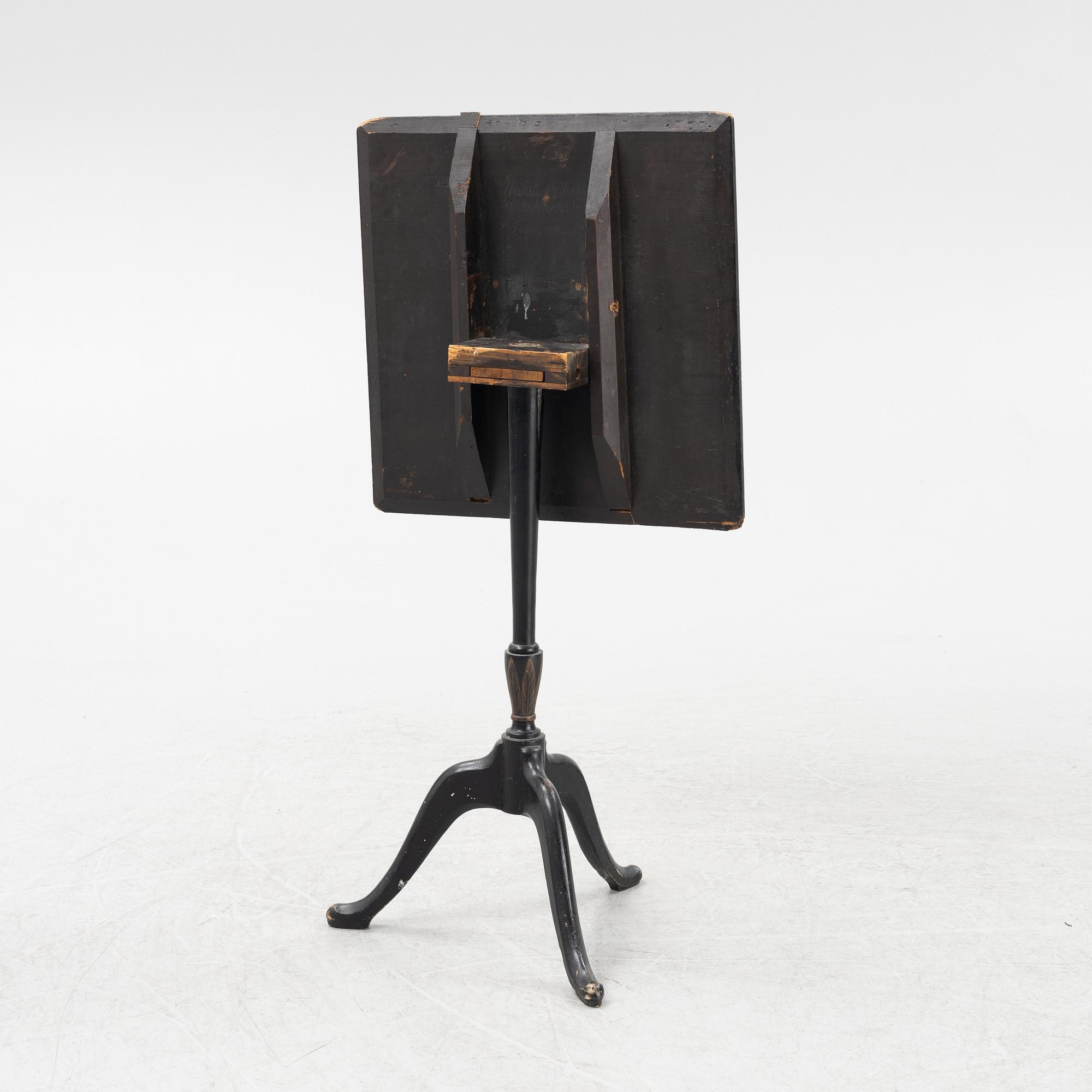 A Swedish tilt top table, from Nils Asplind's workshop signed and dated 1814.