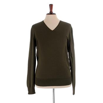 YVES SAINT LAURENT, a men's green wool sweater, size M.