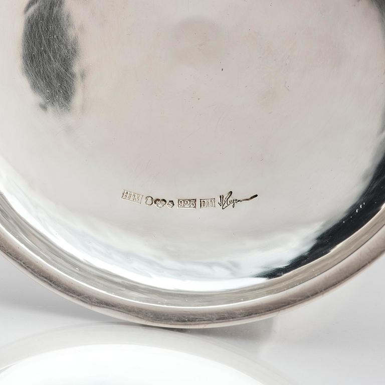 Henrik Ingemansson, a pair of sterling silver and Älvdal porphyry candelsticks, Ingemansson's Smithy, Stockholm, 2002.