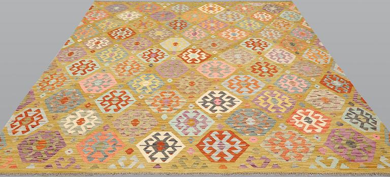 A Kilim carpet, approx. 300 x 259 cm.