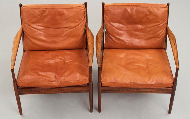 Ib Kofod-Larsen, a pair of "Samsö" palisander and brown leather easy chairs, Olof Persons Fåtöljindustri (OPE) Sweden 1960's.