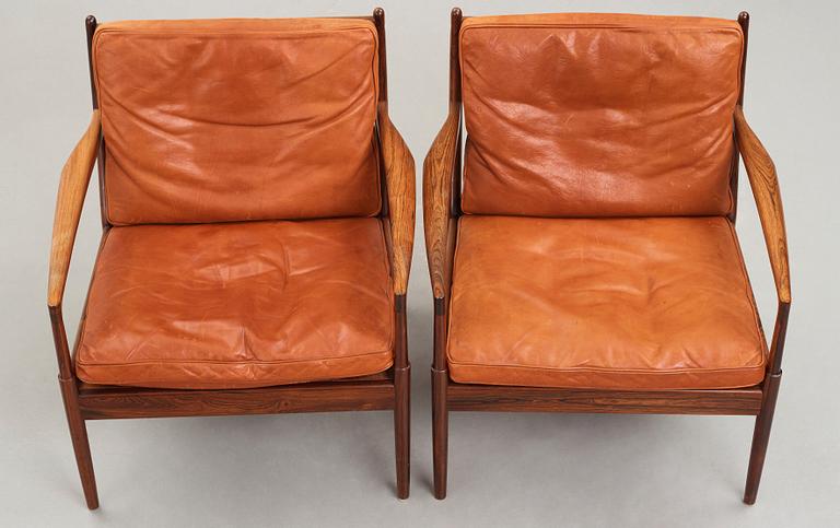 Ib Kofod Larsen, a pair of "Samsö" palisander and brown leather easy chairs, Olof Persons Fåtöljindustri (OPE) Sweden 1960's.