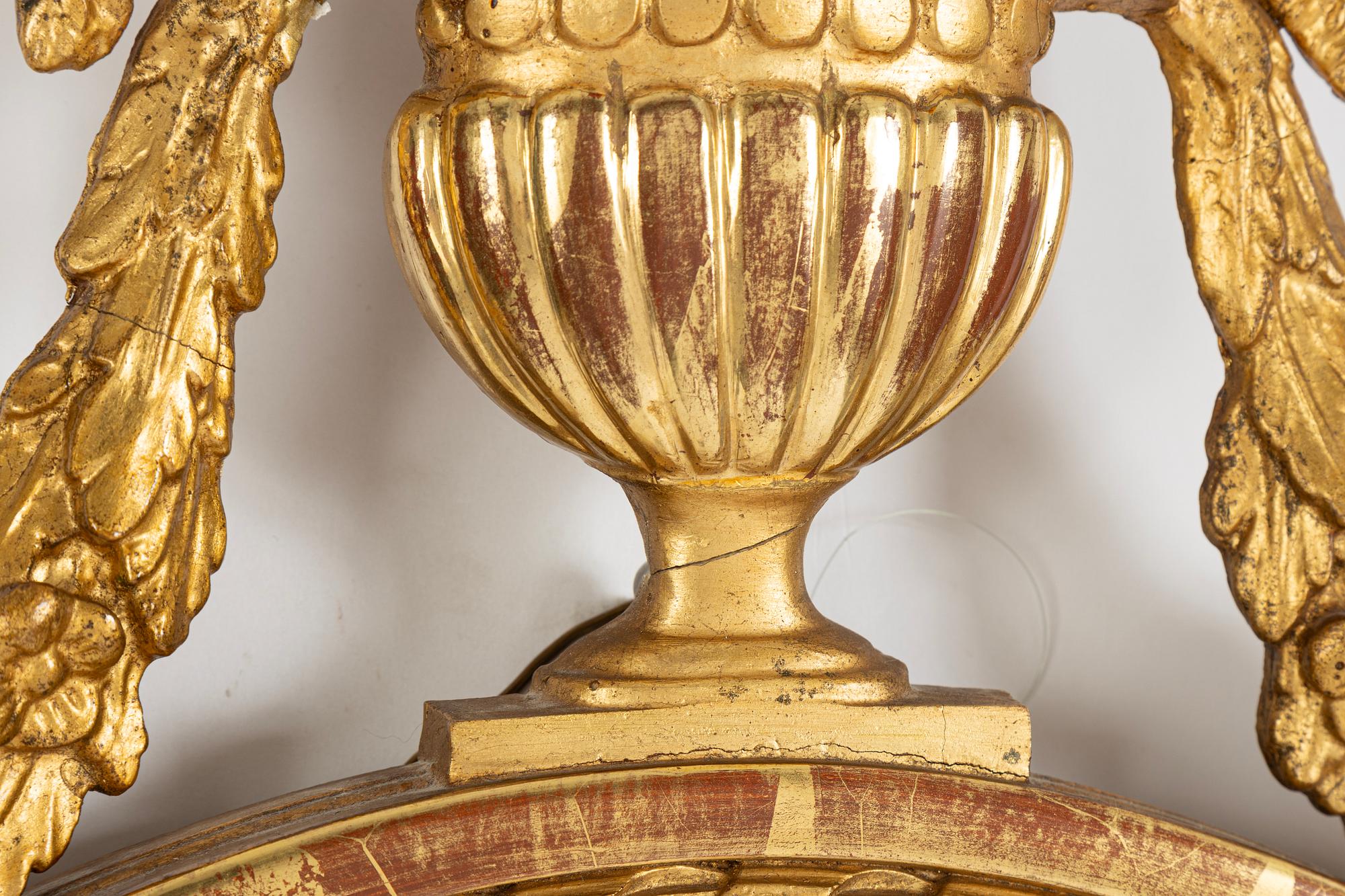 A Gustavian style mirror wall sconce, first half of the 20th Century.