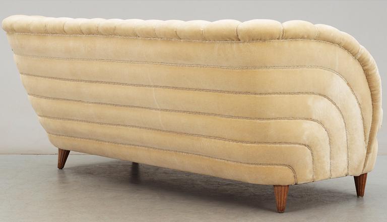 A Swedish off-white velvet plush three-seated sofa, 1930-40's.