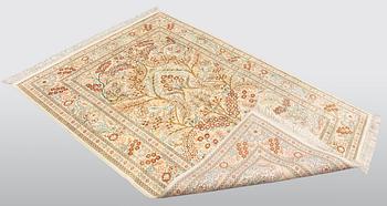 A rug, Oriental silk, ca 154 x 92 cm.