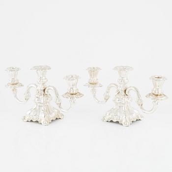 A pair of Baroque style candelabras, early 20th Century.