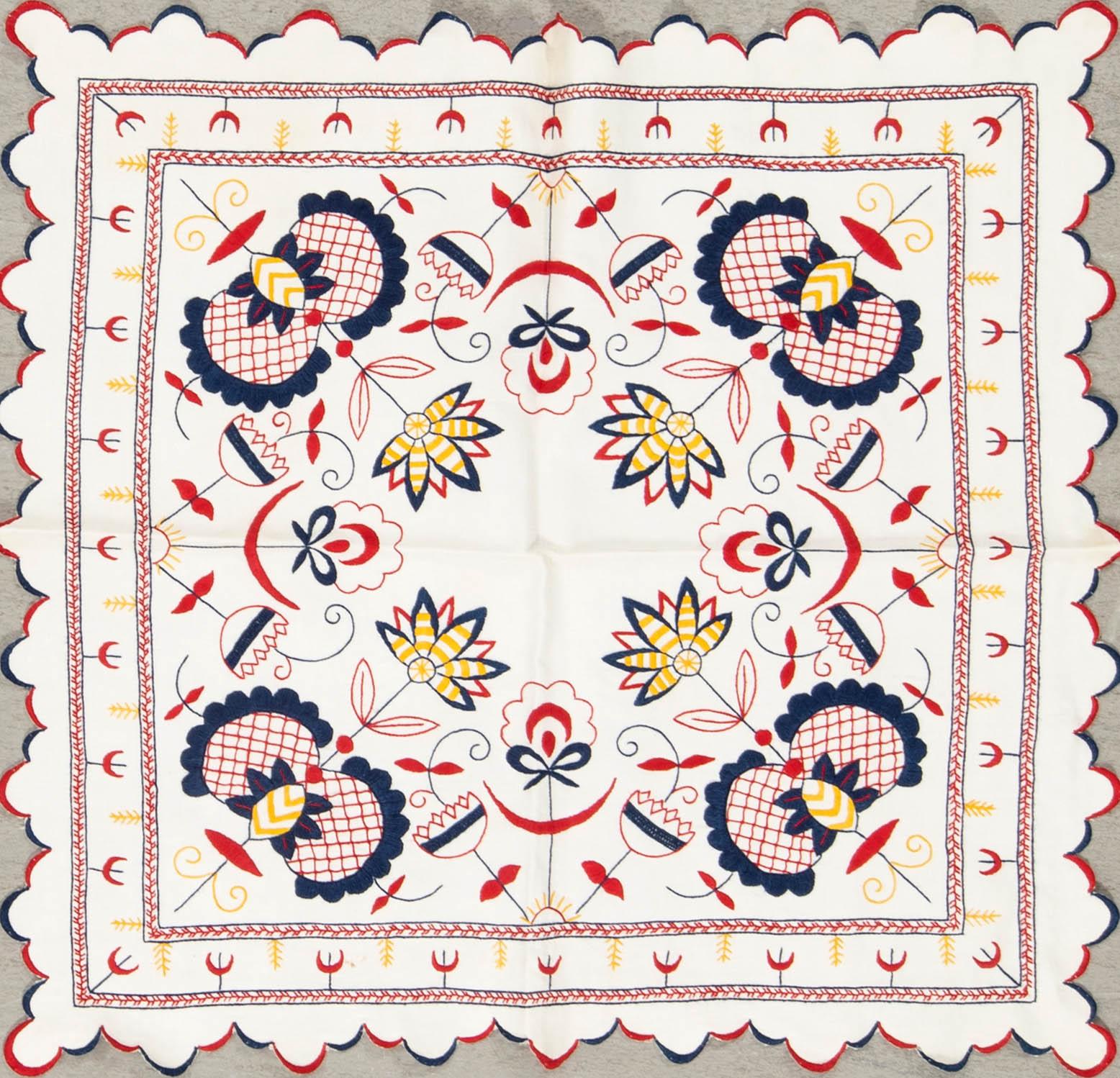 A collection of Christmas tablecloths, Christmas tree skirts, an apron, and runners, 21 pcs, 20th century.