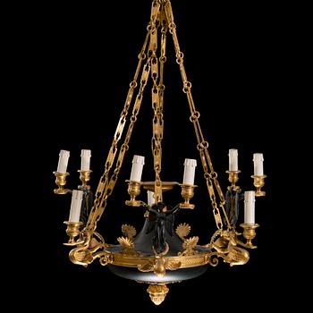 A first half 19th Century empire nine-light hanging lamp.