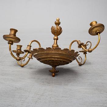 A first half of the 19th century wood chandelier.