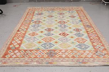 A Kilim carpet, approx. 309 x 203 cm.