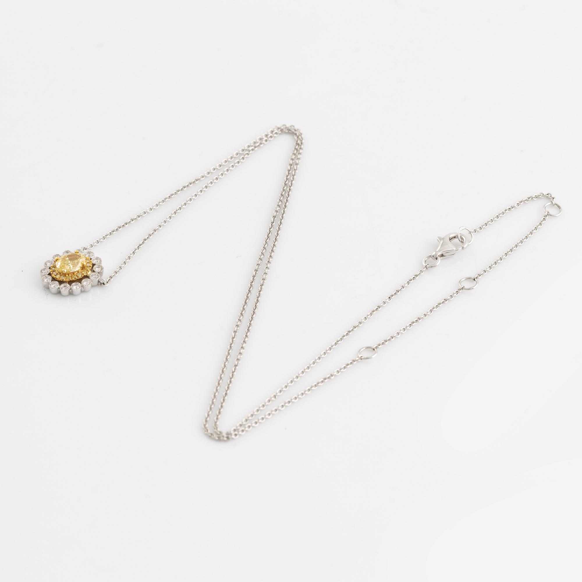 Oval cut yellow diamond and brilliant cut diamond necklace.