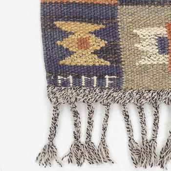 Märta Måås-Fjetterström, a carpet, 'Tolvbladsmattan', flat weave, c. 205 x 95 cm, signed MMF.