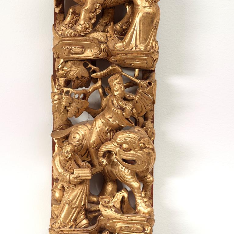 Three carved and gilt wooden panels, Qing dynasty, 19th Century.