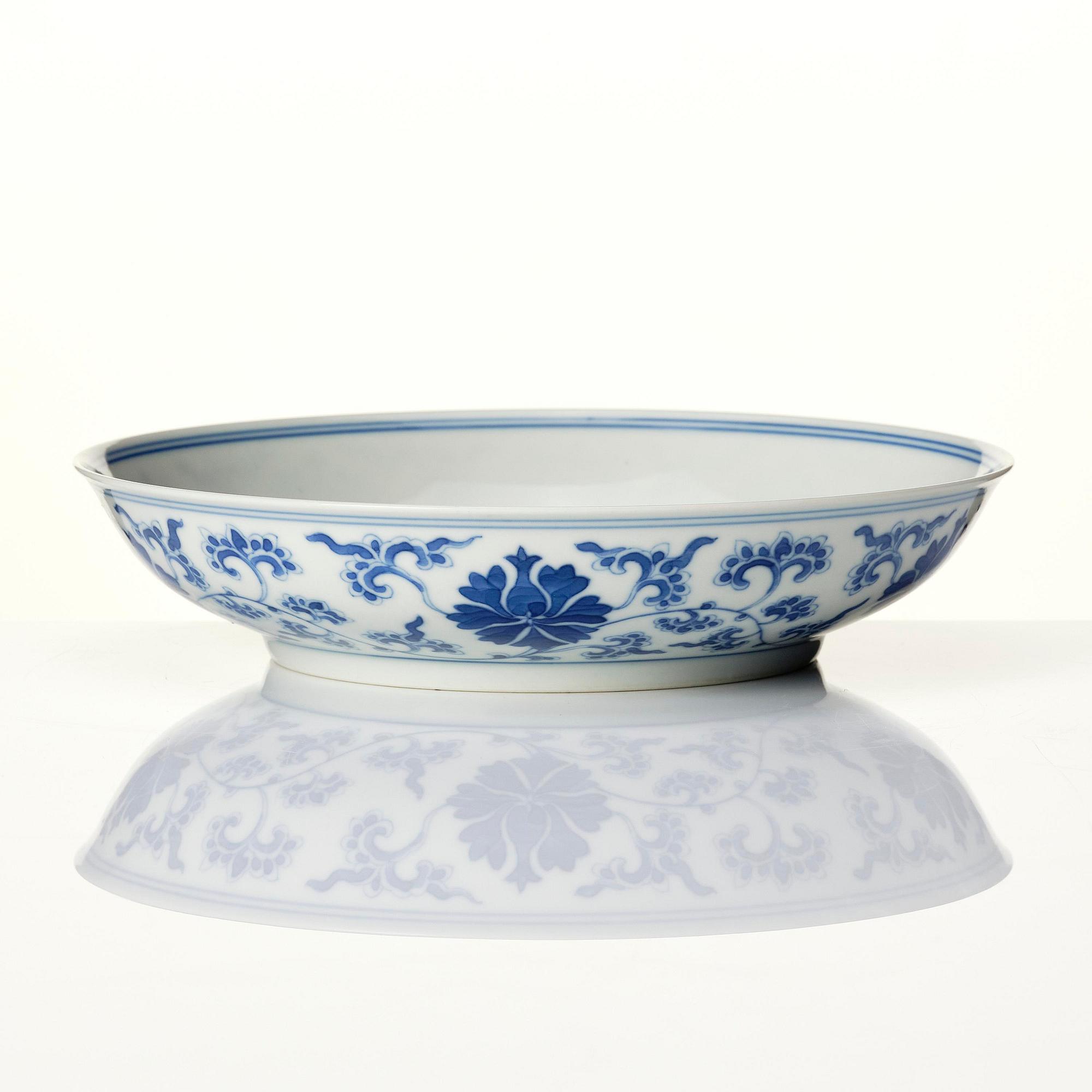A blue and white 'lotus' dish, late Qing/Republic period with Qianlong mark.