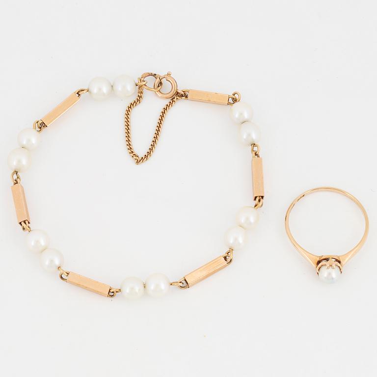 18K gold pearl bracelet and ring.