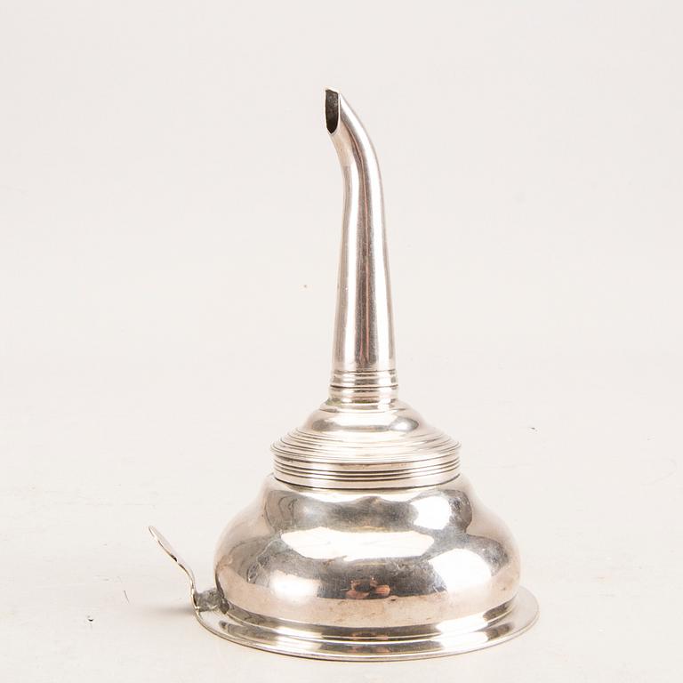 A 19th century English silver wine-strainer London 1813.