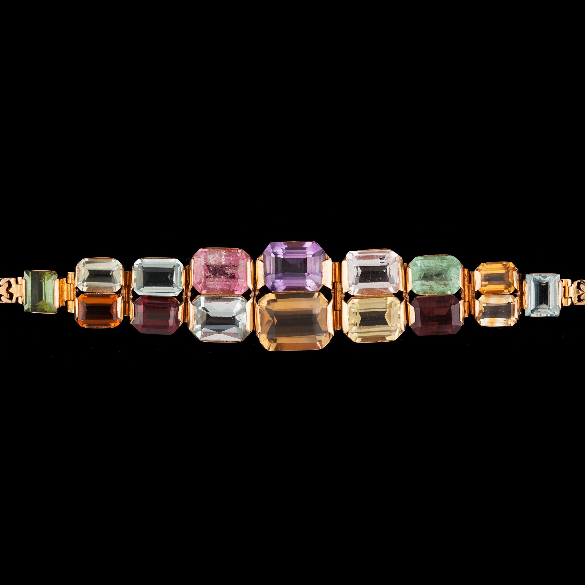 A quartz, beryl and tourmaline bracelet. Made by Swedish goldsmith G. Dahlgern, Malmö.