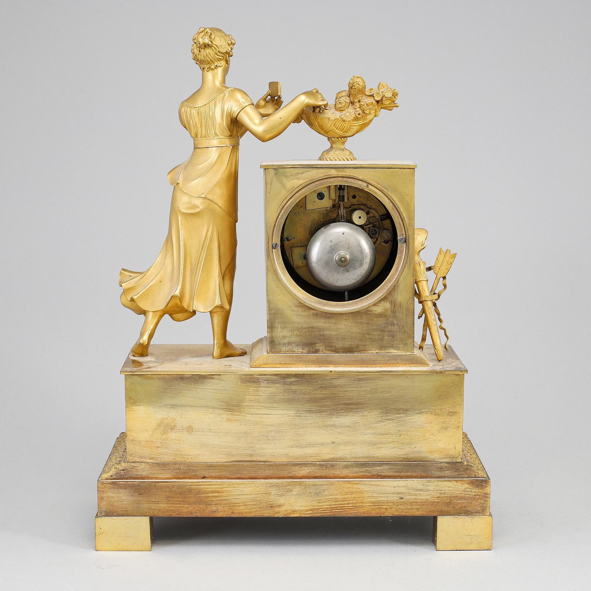 An Empire mantel clock, beginning of the 19th ct.