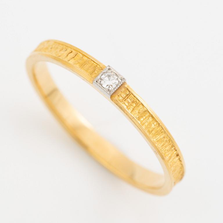 Lapponia ring 18K guld med en åttkantslipad diamant, Finland 1978.