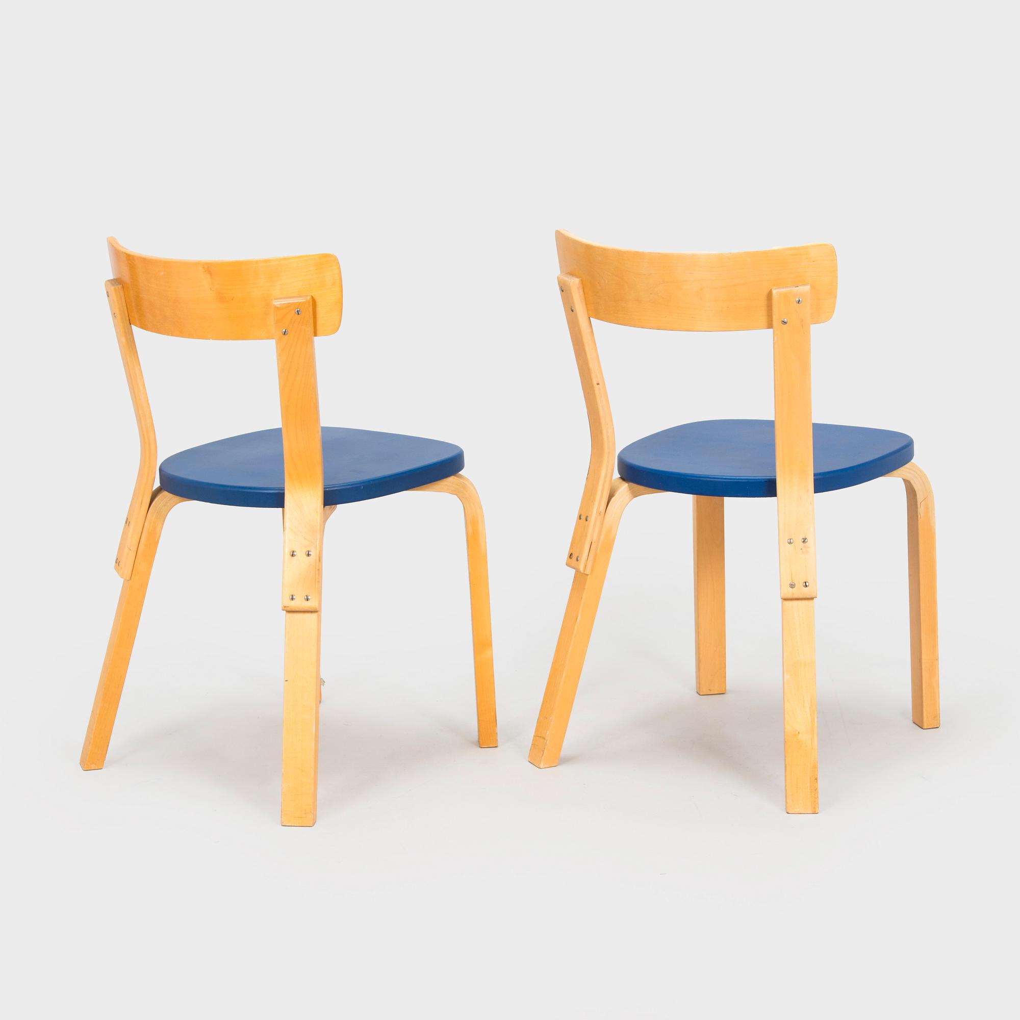 Alvar Aalto, two model 69 chairs, O.Y. Huonekalu- ja Rakennustyötehdas A.B, 1957.
