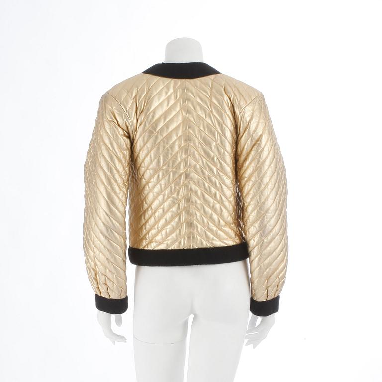 YVES SAINT LAURENT, a gold colored leather jacket.Size 34.
