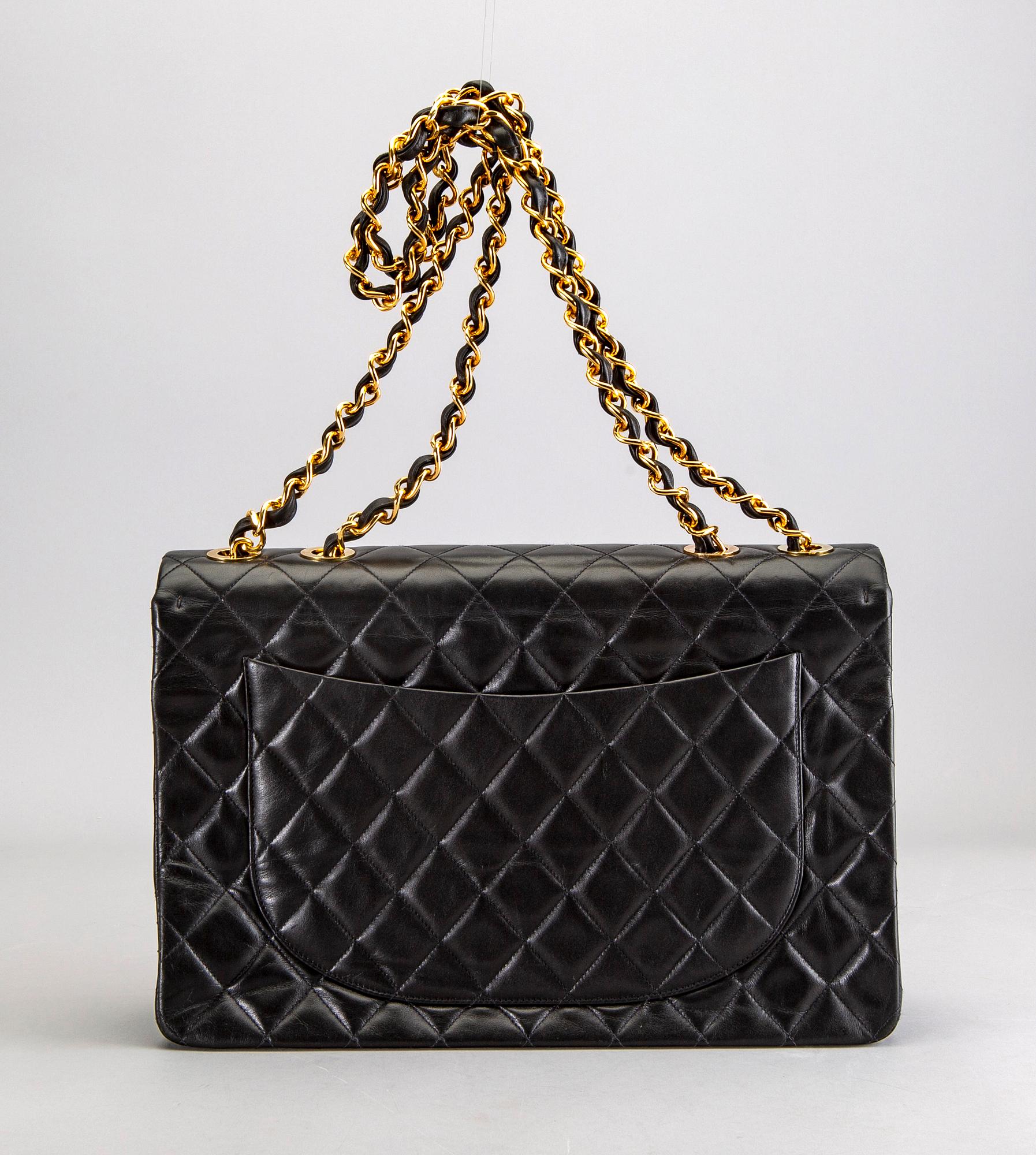 A Chanel maxi jumbo leather bag.