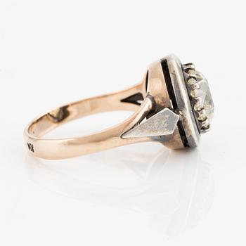 A 14K gold and silver ring with an old-cut diamond.