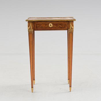 A Louis XVI-style circa 1900 occasional table.