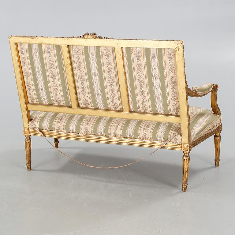 A Louis XVI style sofa from the first half of the 20th century.