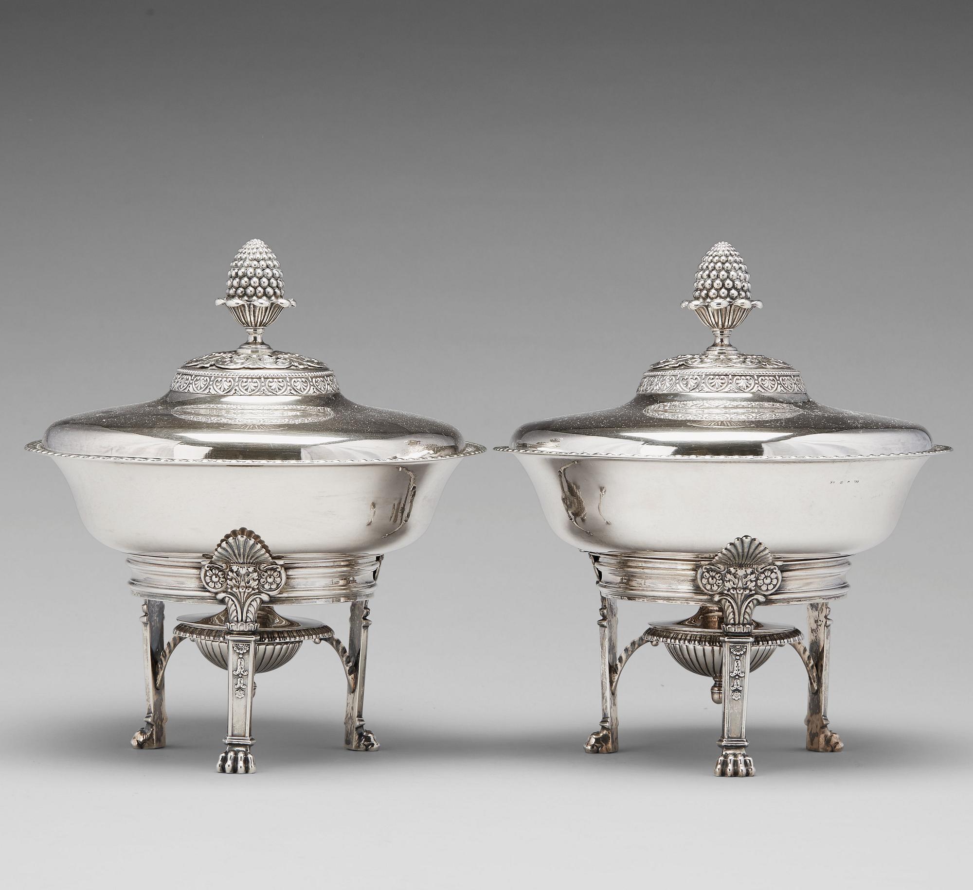 A pair of Swedish Empire silver tureens on stand, mark of Adolf Zethelius, Stockholm 1830.