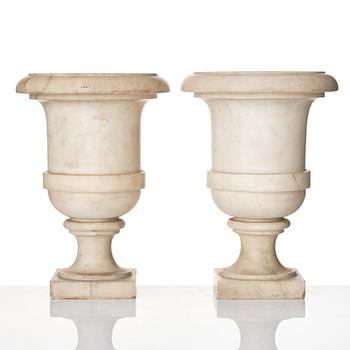 A pair of white marble urns, presumably Italy late 18th century.