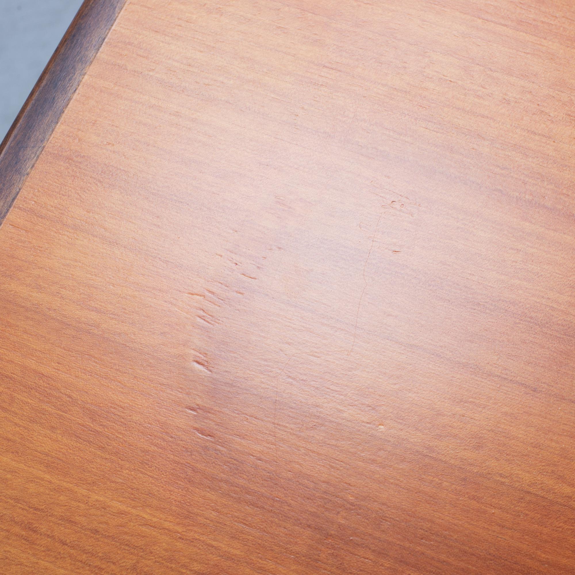 Alvar Aalto, a teak dining table, Artek, Finland, mid 20th Century.