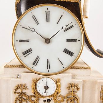 An Empire table clock first half of the 19th century.