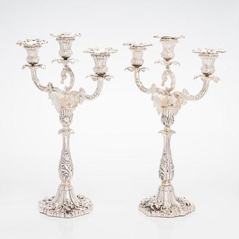 A pair of silver candelabra, maker's mark of Gustaf Möllenborg, Stockholm 1876.