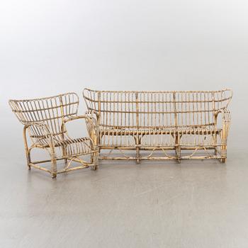 A sofa and a easy chair mid 20th century possibly by Viggo Boesen, Denmark.