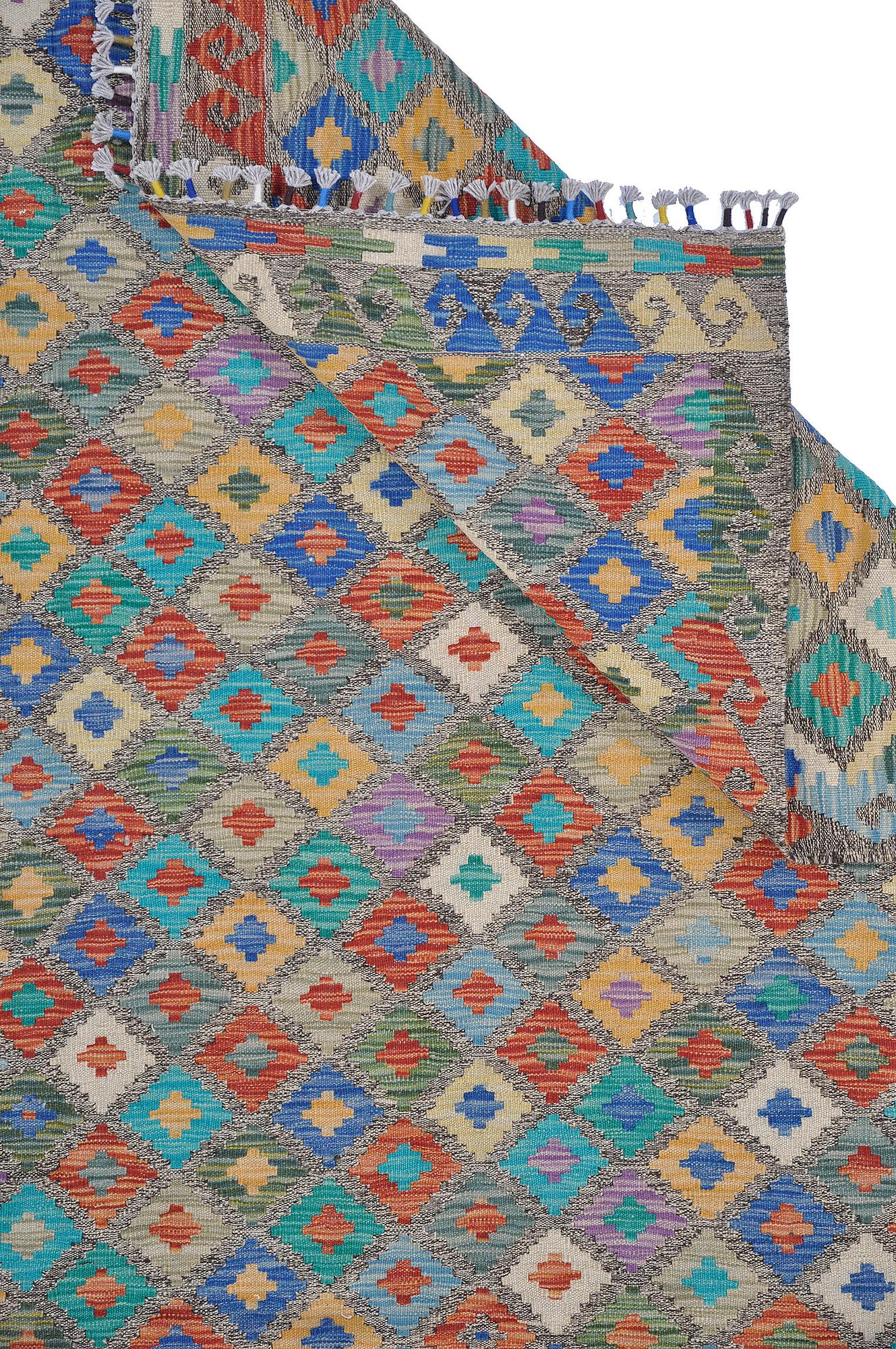 A CARPET, kilim, ca 355 x 258 cm.