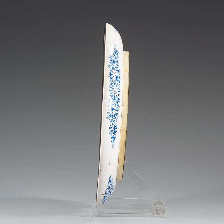 An enamel on copper serving dish, Qing dynasty, 18th Century. With an inscription.