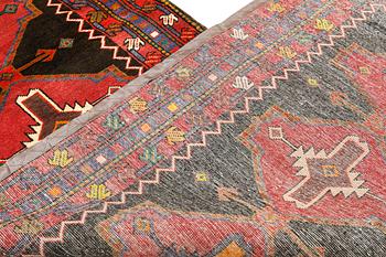 A Tabriz rug, approx. 448 x 114 cm.