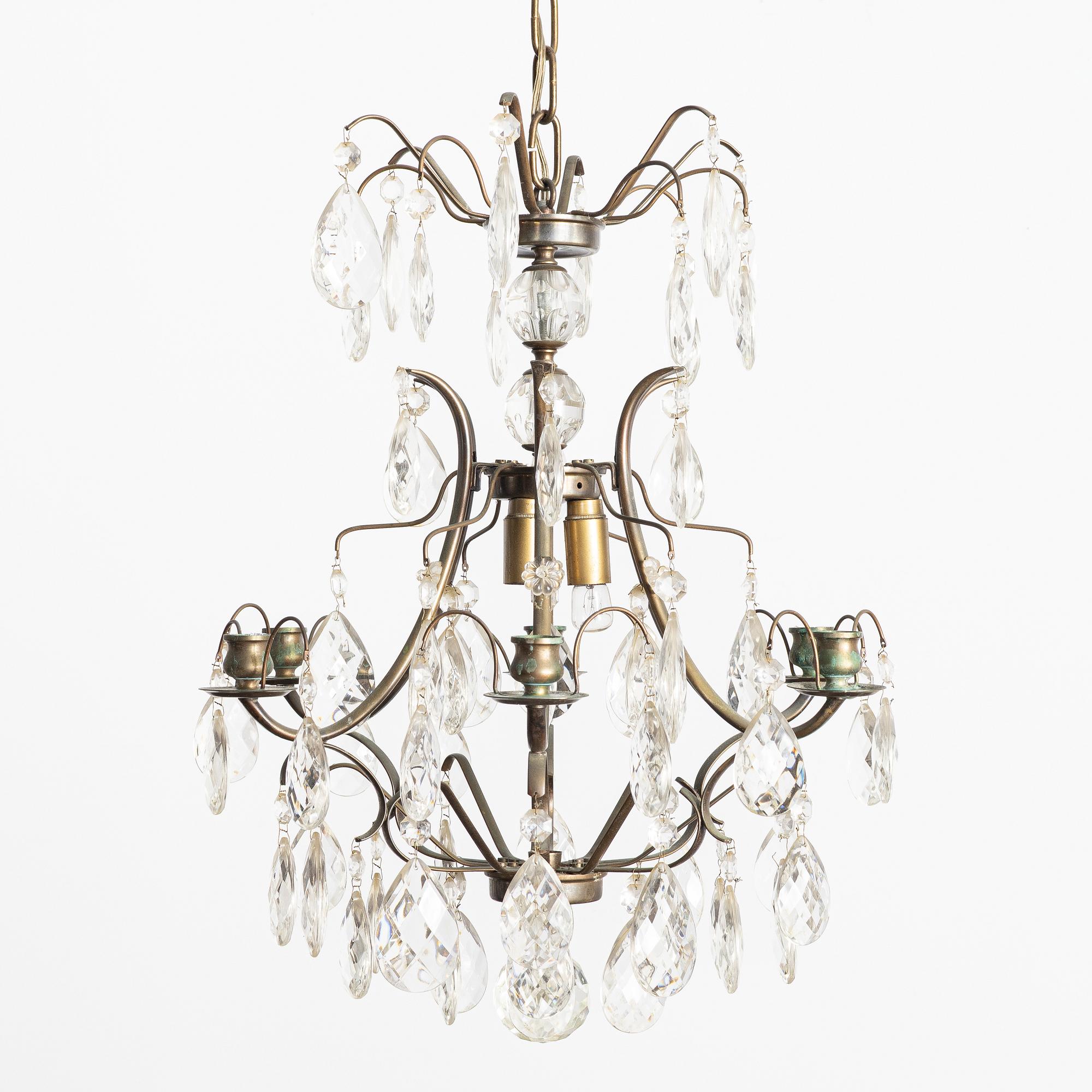 A Rococo.style chandelier, first half of the 20th century.