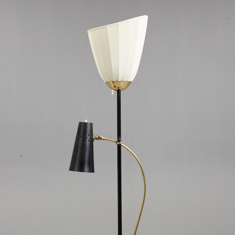 A Swedish Modern brass and black lacquered floor lamp, 1950's.