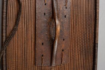 An early 20th Century rattan shield, Mongo-Ngandu, DRC.