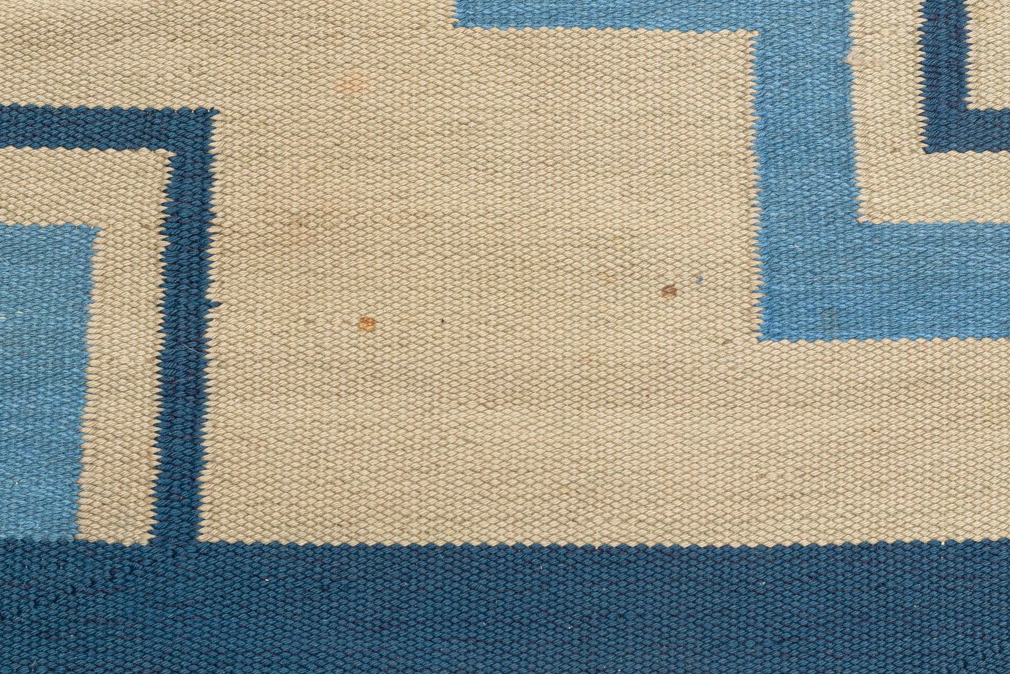 A flat weave carpet, Sweden, dated 1936, c. 370 x 260 cm.
