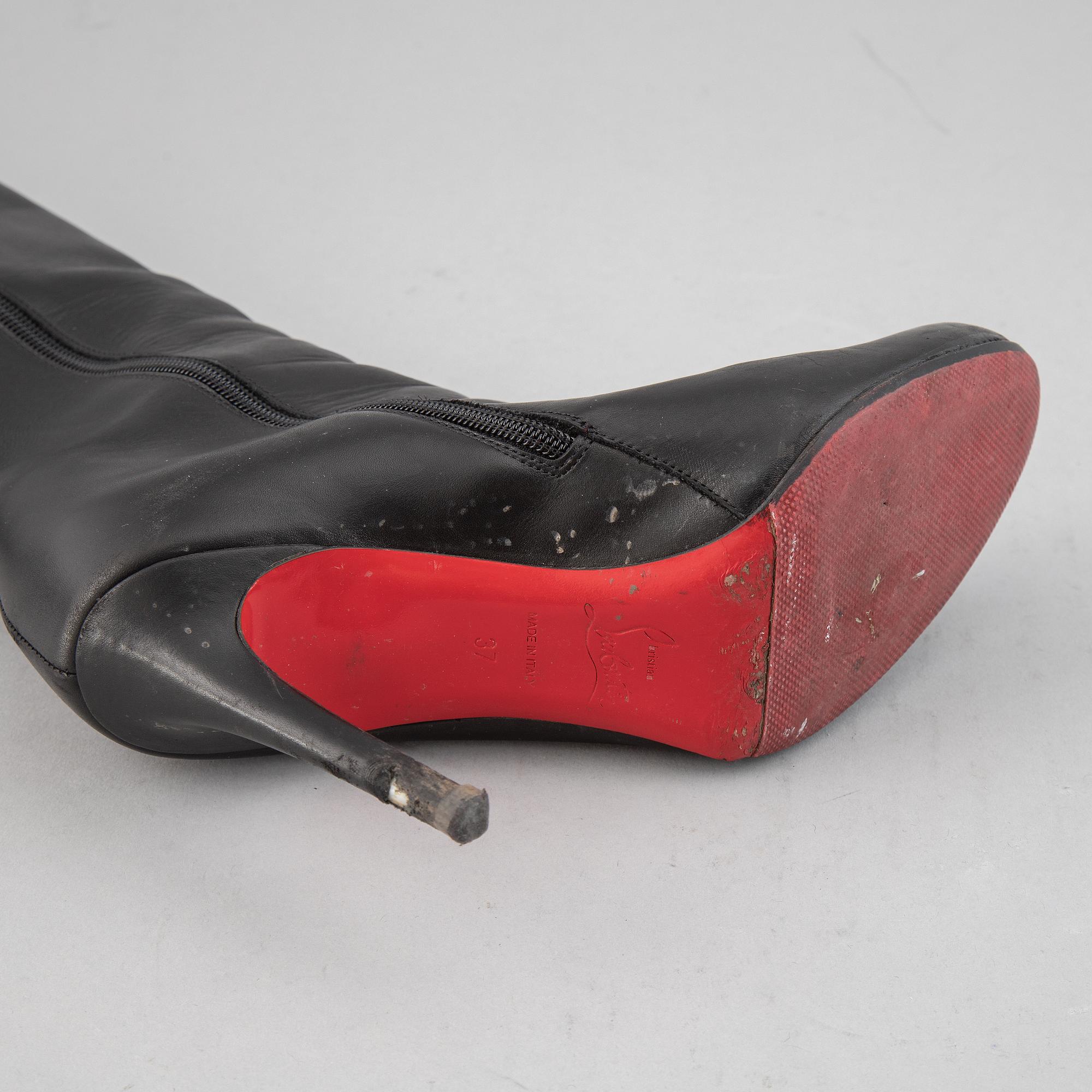 CHRISTIAN LOUBOUTIN, a pair of leather boots, size 37.